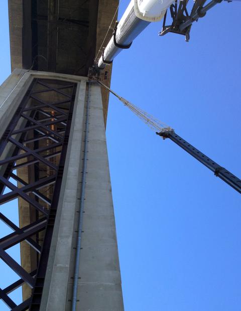Crane at Highway Overpass Work Site